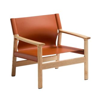 Ontdek de Kave Home Jan fauteuil met massief houten frame en zitting van gerecycled leer. Zachte vormen, ingetogen elegantie en tijdloos design in één fauteuil.