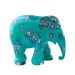 Elephant Parade Walking Through Green Town